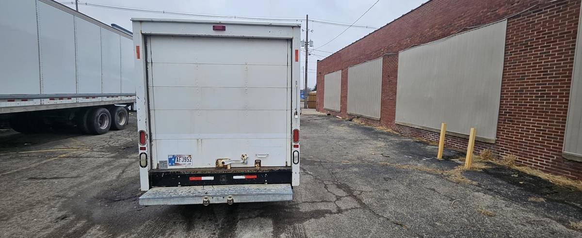 Rear view of the 10-foot box with roll-up door, no loading ramp, and no hitch